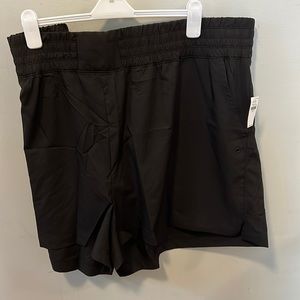 Black Old Navy 4in inseam stretch tech shorts.